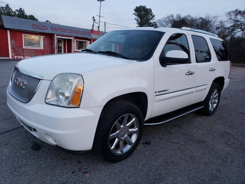 2007 GMC Yukon for sale at GEORGIA AUTO DEALER LLC in Buford GA