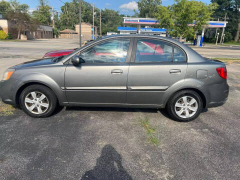 2011 Kia Rio for sale at VINE STREET MOTOR CO in Urbana IL