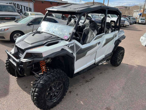 2022 Polaris GENERAL XP 4 for sale at BERKENKOTTER MOTORS in Brighton CO