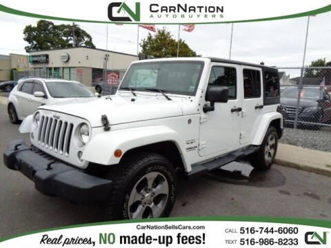 2016 Jeep Wrangler Unlimited for sale at CarNation AUTOBUYERS Inc. in Rockville Centre NY