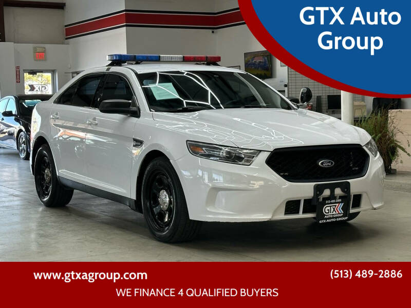 2015 Ford Taurus for sale at GTX Auto Group in West Chester OH