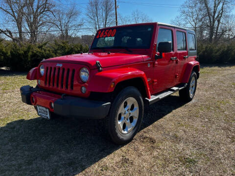 2015 Jeep Wrangler Unlimited for sale at PUTNAM AUTO SALES INC in Marietta OH