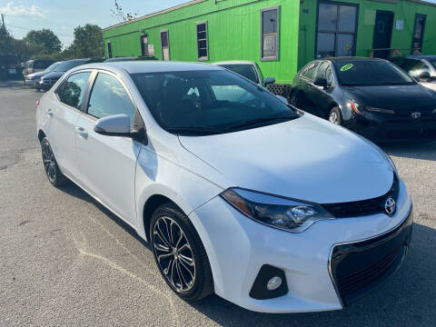2014 Toyota Corolla for sale at Marvin Motors in Kissimmee FL