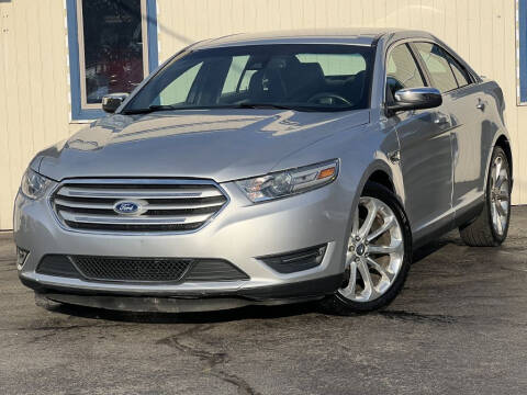 2014 Ford Taurus for sale at Dynamics Auto Sale in Highland IN