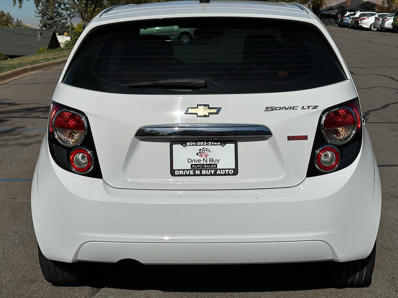 2014 Chevrolet Sonic for sale at DRIVE N BUY AUTO SALES in OGDEN, UT