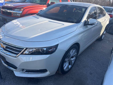 2014 Chevrolet Impala for sale at HIDALGOS AUTO SALES in Omaha NE