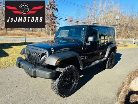 2011 Jeep Wrangler Unlimited for sale at J & J MOTORS in New Milford CT