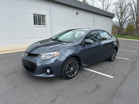 2014 Toyota Corolla for sale at Noble Auto in Hickory NC