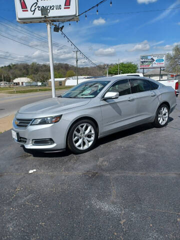 2014 Chevrolet Impala for sale at SIMS AUTO GROUP LLC in Zanesville OH