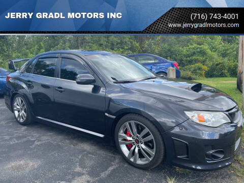 2012 Subaru Impreza for sale at JERRY GRADL MOTORS INC in North Tonawanda NY