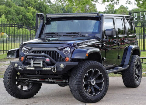 2013 Jeep Wrangler Unlimited for sale at Texas Auto Corporation in Houston TX