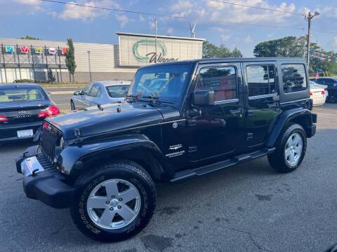 2012 Jeep Wrangler Unlimited for sale at Bavarian Auto Gallery in Bayonne NJ