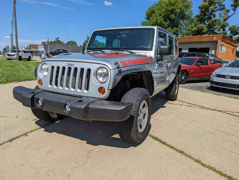 2011 Jeep Wrangler Unlimited for sale at Lamarina Auto Sales in Dearborn Heights MI