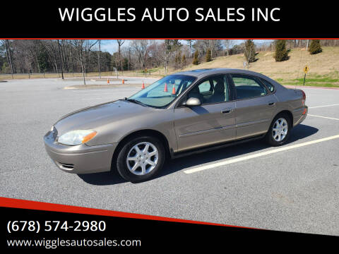 2007 Ford Taurus for sale at WIGGLES AUTO SALES INC in Mableton GA