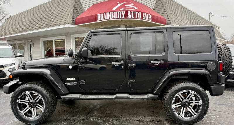 2011 Jeep Wrangler Unlimited for sale at BRADBURY AUTO SALES in Gibson City IL