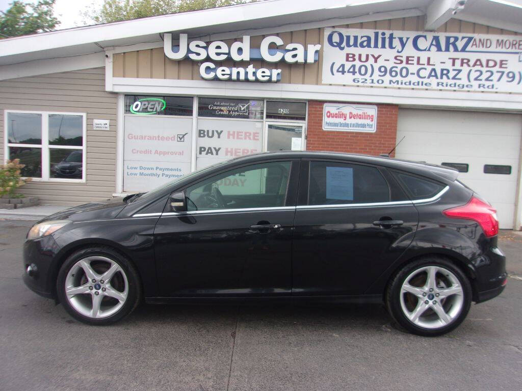 Black 2012 Ford Focus Titanium Titanium 4dr Hatchback 1
