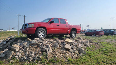 2006 Dodge Dakota for sale at BERG AUTO MALL & TRUCKING INC in Beresford SD