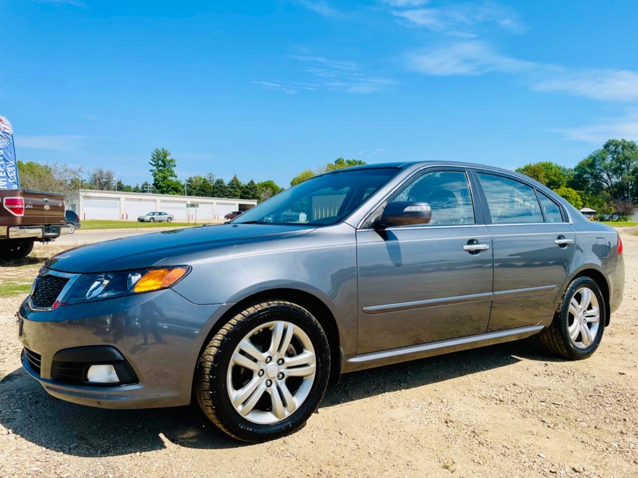 2009 Kia Optima for sale at Top Gear Auto Sales LLC in Le Roy, MN