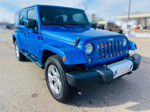 2014 Jeep Wrangler Unlimited for sale at Island Auto in Grand Island NE
