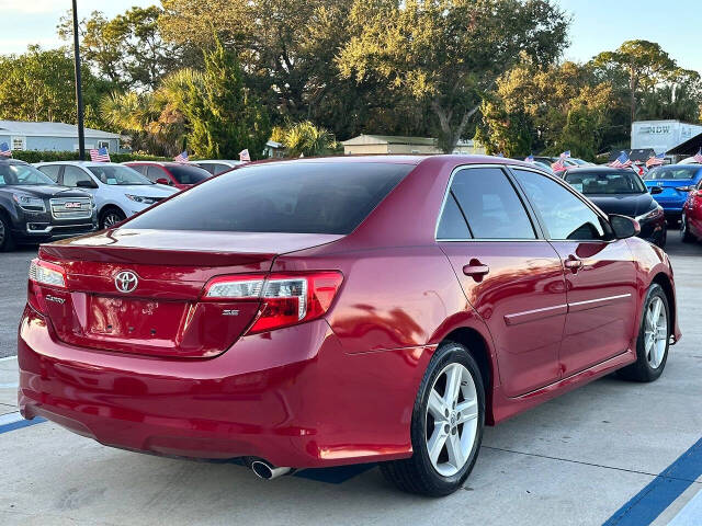 2014 Toyota Camry for sale at DJA Autos Center in Orlando, FL