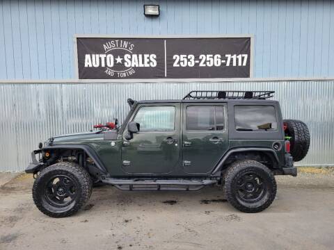 2011 Jeep Wrangler Unlimited for sale at Austin's Auto Sales in Edgewood WA