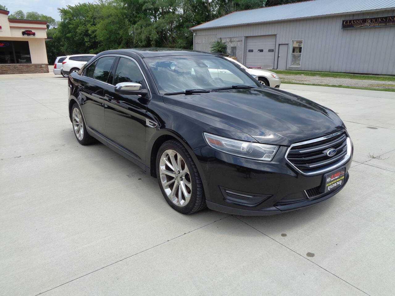 2014 Ford Taurus for sale at El Paso Auto Sale in Des Moines, IA