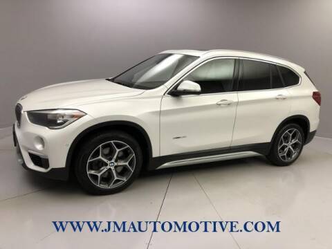 2018 BMW X1 for sale at J & M Automotive in Naugatuck CT