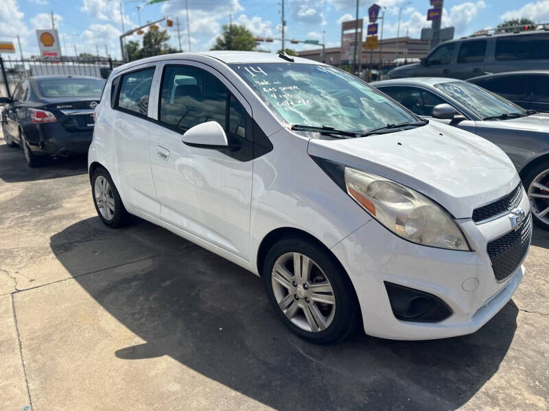 2014 Chevrolet Spark for sale at Buy-Fast Autos in Houston TX