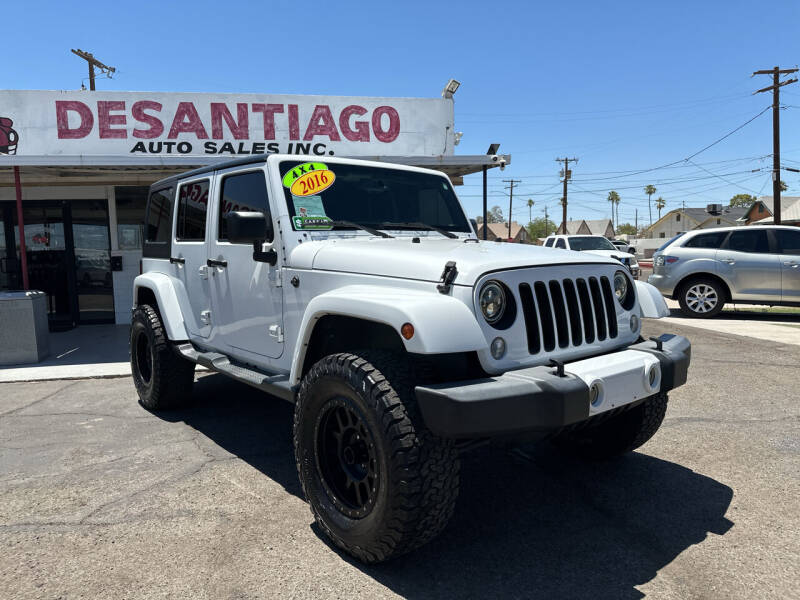 2016 Jeep Wrangler Unlimited for sale at DESANTIAGO AUTO SALES in Yuma AZ