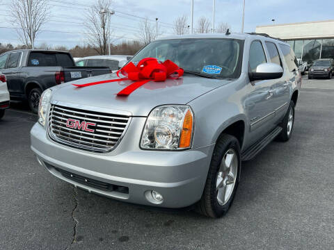 2013 GMC Yukon XL for sale at Charlotte Auto Group, Inc in Monroe NC