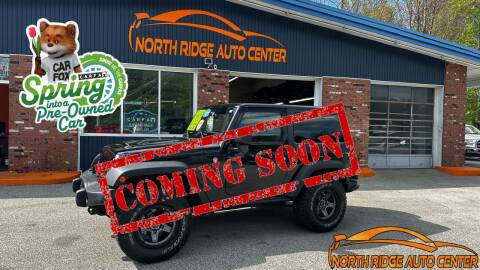 2013 Jeep Wrangler for sale at North Ridge Auto Center LLC in Madison OH