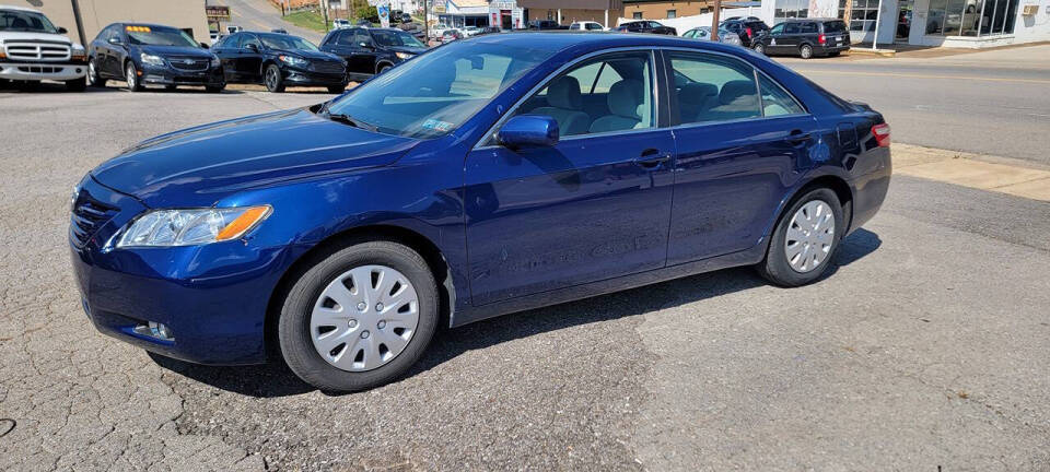 2007 Toyota Camry for sale at Cars For Less in Clarksville, TN