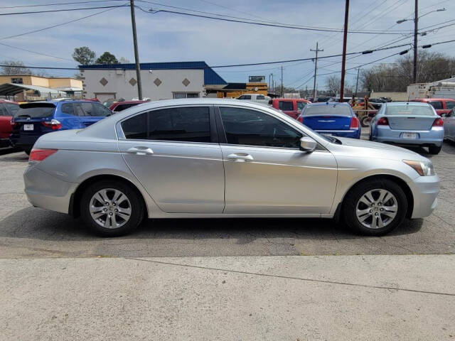 2012 Honda Accord for sale at DAGO'S AUTO SALES LLC in Dalton, GA