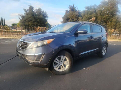 2011 Kia Sportage for sale at Empire Motors in Acton CA