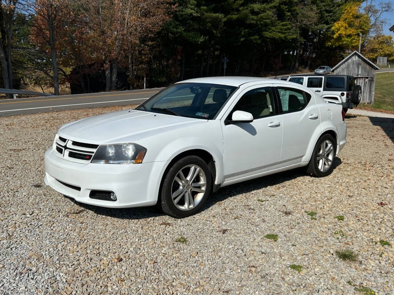 2014 Dodge Avenger for sale at STRODES AUTO GROUP LLP in Malta, OH