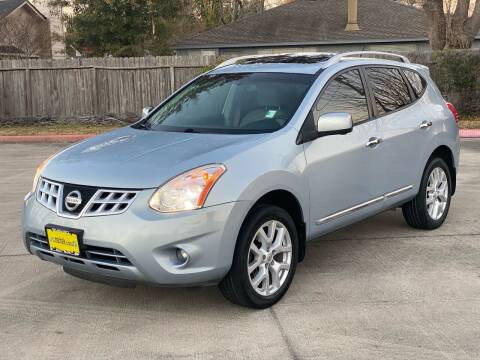 2013 Nissan Rogue for sale at KM Motors LLC in Houston TX