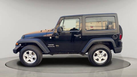 2014 Jeep Wrangler for sale at MILLENNIUM CARS in San Diego CA