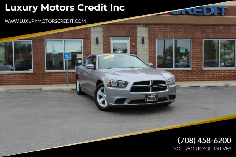 2014 Dodge Charger for sale at Luxury Motors Credit Inc in Bridgeview IL