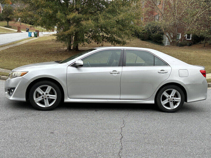 2012 Toyota Camry for sale at SHURE AUTO SALES in Snellville, GA