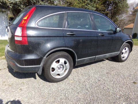 2009 Honda CR-V for sale at English Autos in Grove City PA