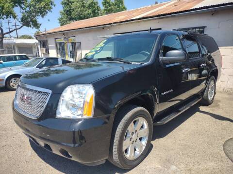 2012 GMC Yukon XL for sale at Larry's Auto Sales Inc. in Fresno CA
