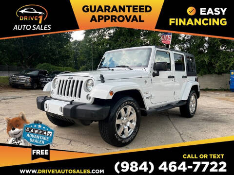 2016 Jeep Wrangler Unlimited for sale at Drive 1 Auto Sales in Wake Forest NC