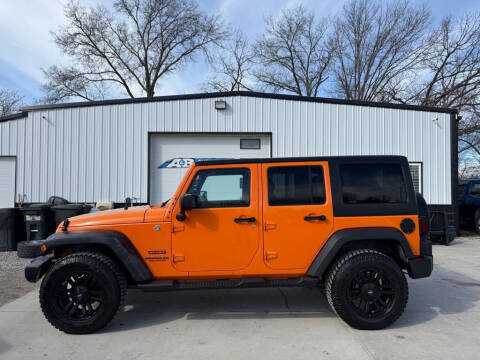 2012 Jeep Wrangler Unlimited for sale at A & B AUTO SALES in Chillicothe MO