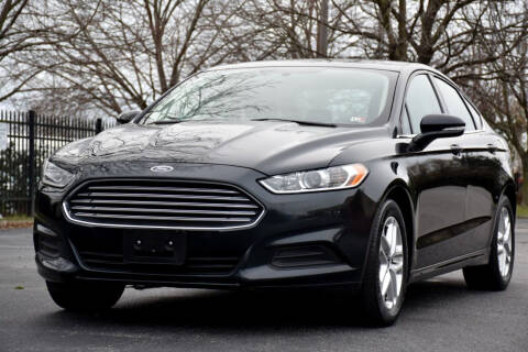 2014 Ford Fusion for sale at Wheel Deal Auto Sales LLC in Norfolk VA