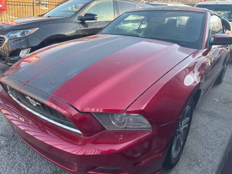 2014 Ford Mustang for sale at HIDALGOS AUTO SALES in Omaha NE