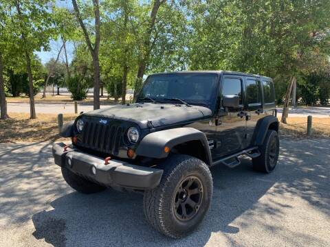 2013 Jeep Wrangler Unlimited for sale at Race Auto Sales in San Antonio TX