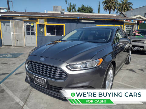 2014 Ford Fusion for sale at FJ Auto Sales North Hollywood in North Hollywood CA