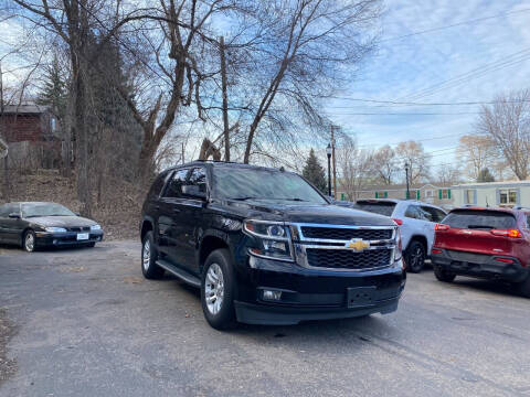 2015 Chevrolet Tahoe for sale at Rams Auto Sales LLC in South Saint Paul MN