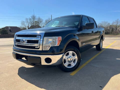 2013 Ford F-150 for sale at AUTO DIRECT Bellaire in Houston TX