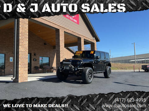 2014 Jeep Wrangler Unlimited for sale at D & J AUTO SALES in Joplin MO